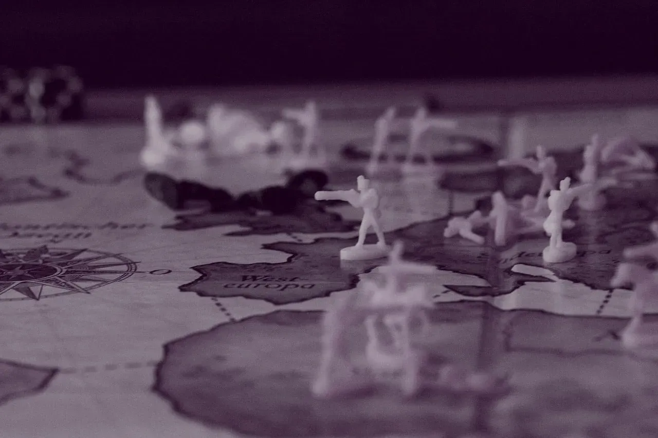 Toy soldier figures on a board game map